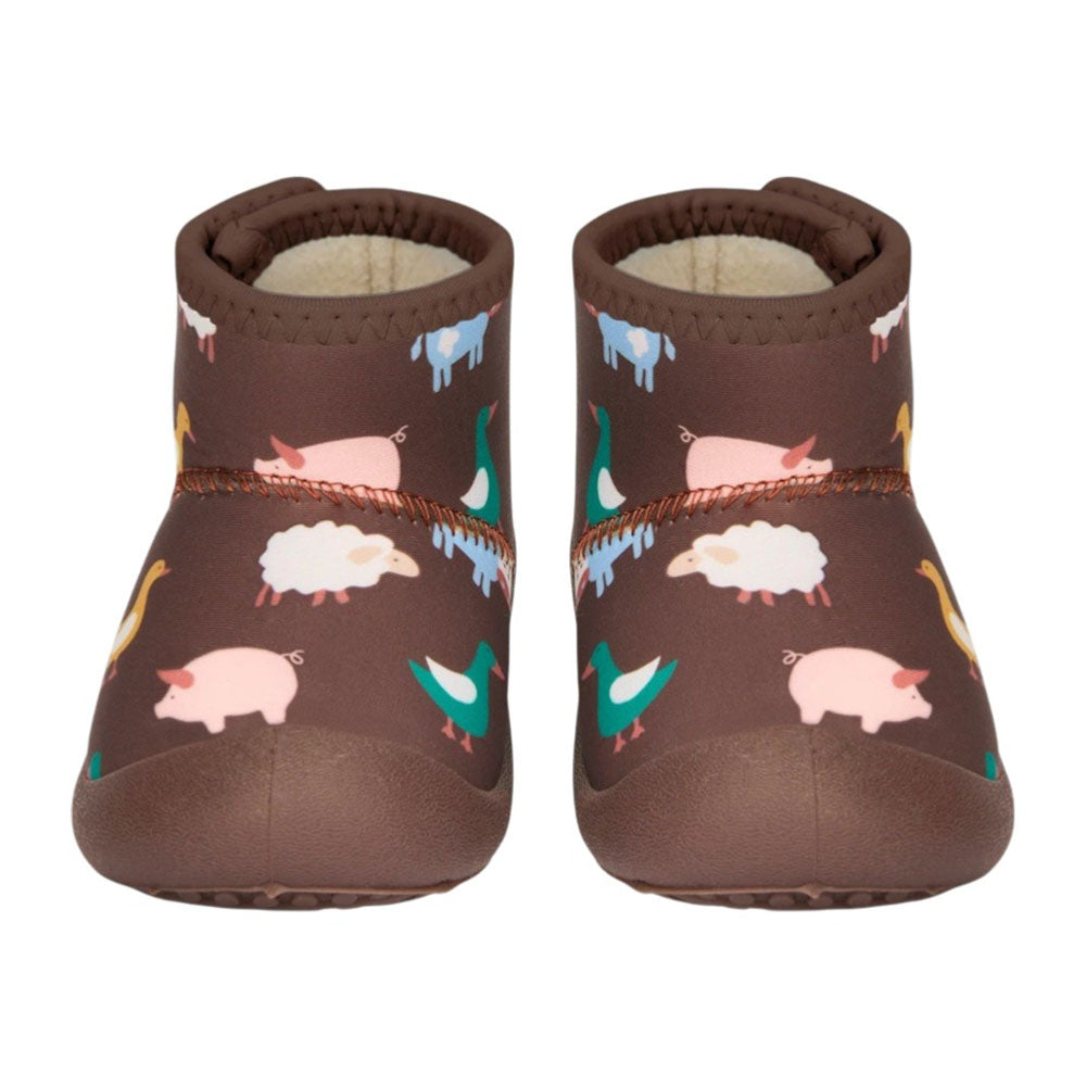 Toshi’s Gumbooties Neoprene Mystical Farm Buddies baby booties feature cartoon animal prints—pink pigs, white sheep, green ducks, yellow chickens, and blue cows—displayed side by side facing forward.