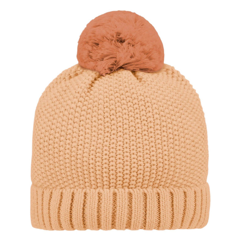 The Toshi Organic Beanie Bobby Oak is a beige beanie by Toshi, crafted from soft organic cotton with a thick ribbed cuff and topped with a large, fluffy light brown pom-pom for warmth and comfort.