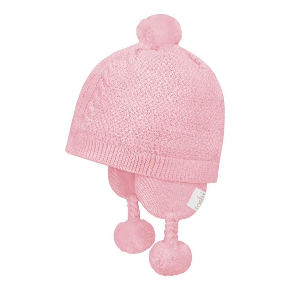 The Toshi Organic Earmuff Yummy Misty Rose by Toshi is a light pink organic cotton baby hat featuring ear flaps with braided tassels and cute pom-poms—ideal as a cozy newborn winter hat.