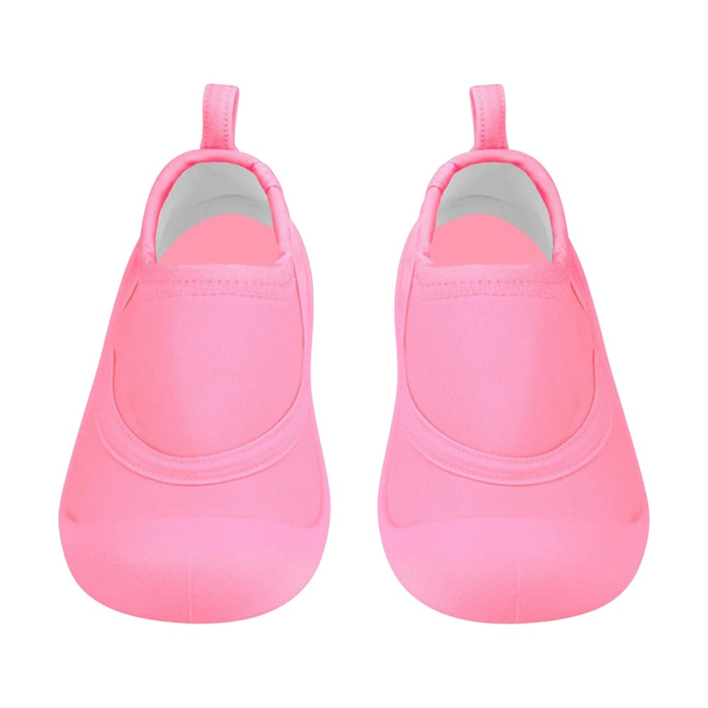 Toshi Swim Reef Booties Beachcomber Watermelon by Toshi, bright pink neoprene baby booties with rounded toes, white interiors, skid-resistant soles, and back pull tabs, displayed side by side on a white background.