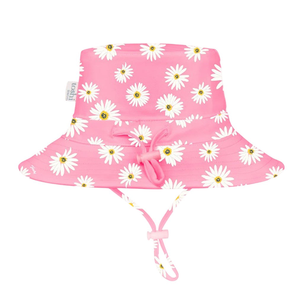 The Toshi Swim Sunhat Paradise Daisy Watermelon by Toshi features a pink daisy print, UPF50+ sun protection, wide brim, chin strap, and front bow—ideal for stylish baby swimwear.