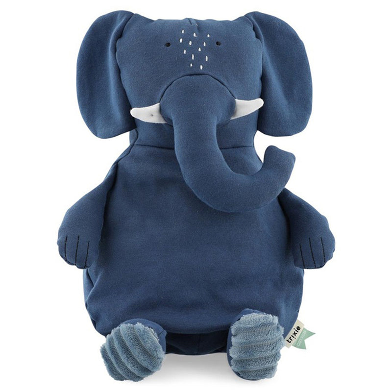 The Trixie Plush Toy Large Mrs Elephant by Trixie is a soft, eco-friendly blue elephant made from organic cotton plush, featuring floppy ears, small tusks, stitched eyes, a curved trunk, round arms, and ribbed feet. Sits upright.