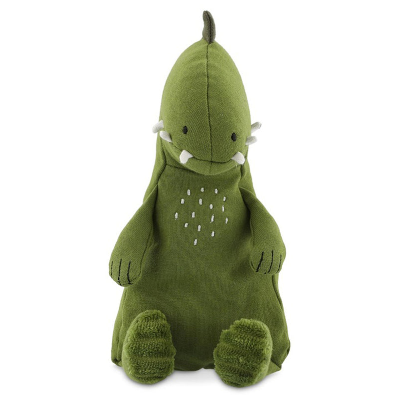 The Trixie Plush Toy Small Mr Dino by Trixie is a soft, green dinosaur with white cheek spikes, stitched chest details, and round textured feet, shown sitting upright against a white background.