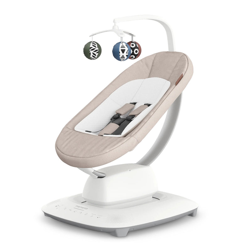 The UPPAbaby Mamaroo Smart Swing by UPPAbaby features a modern beige and white design, soft seat with safety harness, white base with control buttons, and a mobile arm holding two hanging toys above the seat.