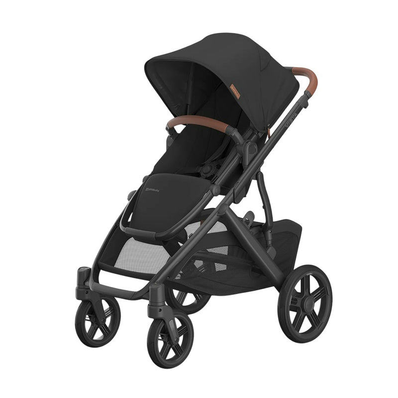 The UPPAbaby Vista V3 Pram Nori in black features a sun canopy, brown handlebar, upgraded suspension, four large wheels, and an underseat storage basket, shown side-on against a white background.