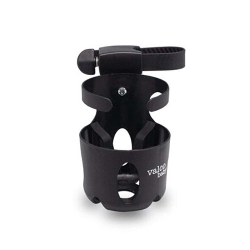 The Valco Baby Universal Bottle Holder is a black plastic cup holder with an adjustable clamp, suitable for strollers, wheelchairs, or bikes. It features multiple openings and “Valco Baby” branding on the side.