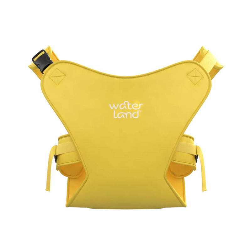 The Waterland Carrier by Waterland is a yellow neoprene baby carrier with padded shoulder straps, side pockets, and “Water Land” in white on the front. Enjoy comfort, support, and hands-free convenience for on-the-go parenting.