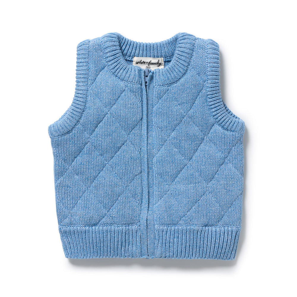 The Wilson & Frenchy Frosted Blue Organic Knitted Vest is a sleeveless, quilted, light blue vest in organic cotton with a zipper front and ribbed edges—perfect for layering, finished with an inside neckline label.