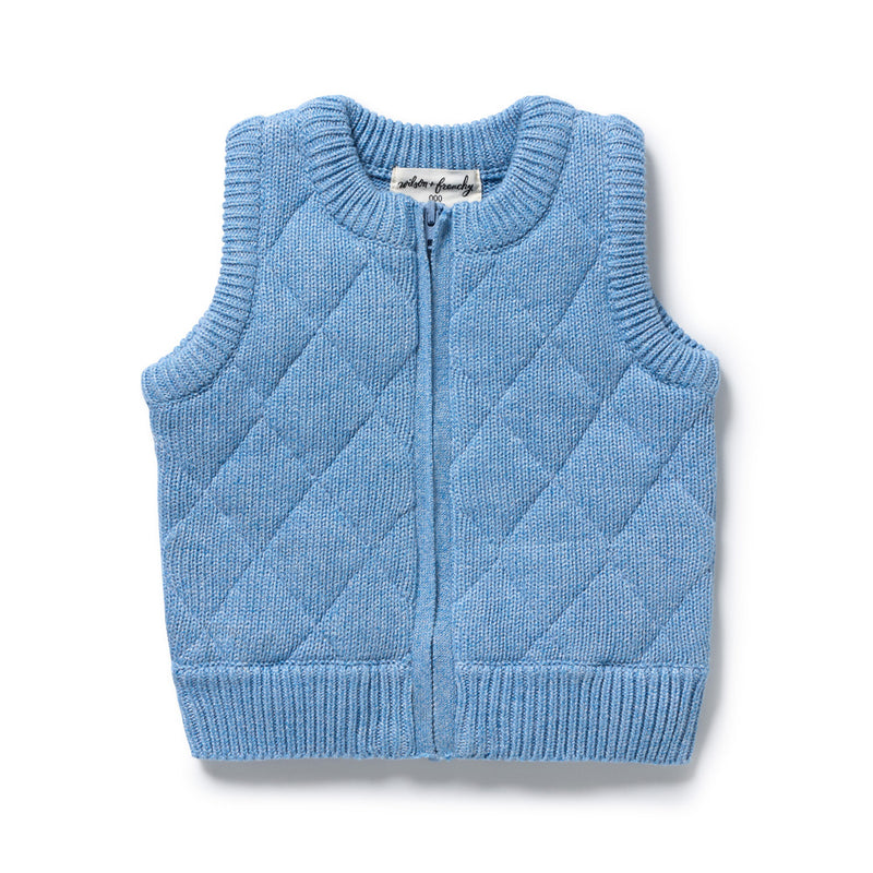 The Wilson & Frenchy Frosted Blue Organic Knitted Vest is a sleeveless, quilted, light blue vest in organic cotton with a zipper front and ribbed edges—perfect for layering, finished with an inside neckline label.