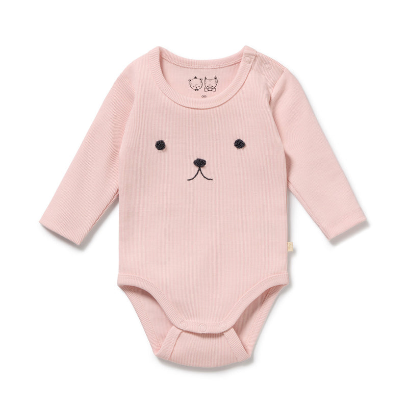 The Wilson & Frenchy Strawberry Cream Organic Rib Long Sleeved Bodysuit features a light pink color, cute animal face embroidery, snap buttons on one shoulder, and a snap crotch for easy changing.