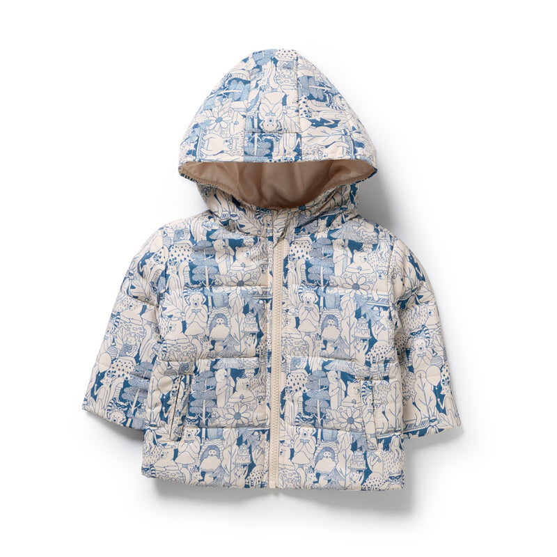 The Wilson & Frenchy Woodland Adventures Puffer Jacket is a kids’ zip-front, hooded jacket made from recycled polyester, featuring a blue and white woodland animal and plant print on a light background.