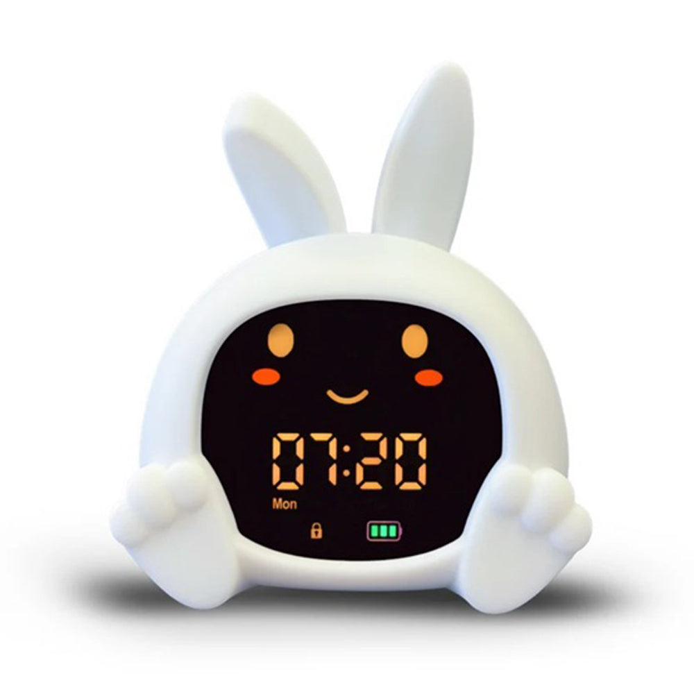 Zazu Sarah the Rabbit by Zazu is a cute white bunny-shaped children’s alarm clock with ears, paws, a smiling face, and an LED display showing 07:20, "Mon," lock and battery icons—perfect for kids' sleep training.