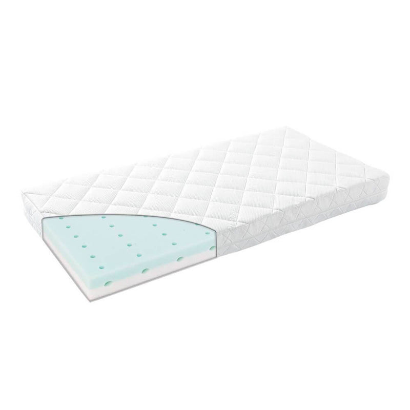 The Leander Linea & Luna Cot Mattress Comfort by Leander is a white baby mattress with a quilted zip-off cover, shown with a cutaway corner revealing pressure-relieving light blue cold foam and inside ventilation holes.