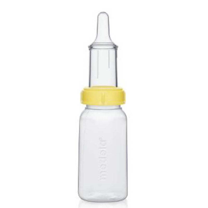 The Medela Special Needs Feeder 150ml is a clear plastic baby bottle with a yellow collar and silicone nipple, designed for cleft palate feeding, featuring controllable milk flow, measurement markings, and the Medela name embossed on its side.