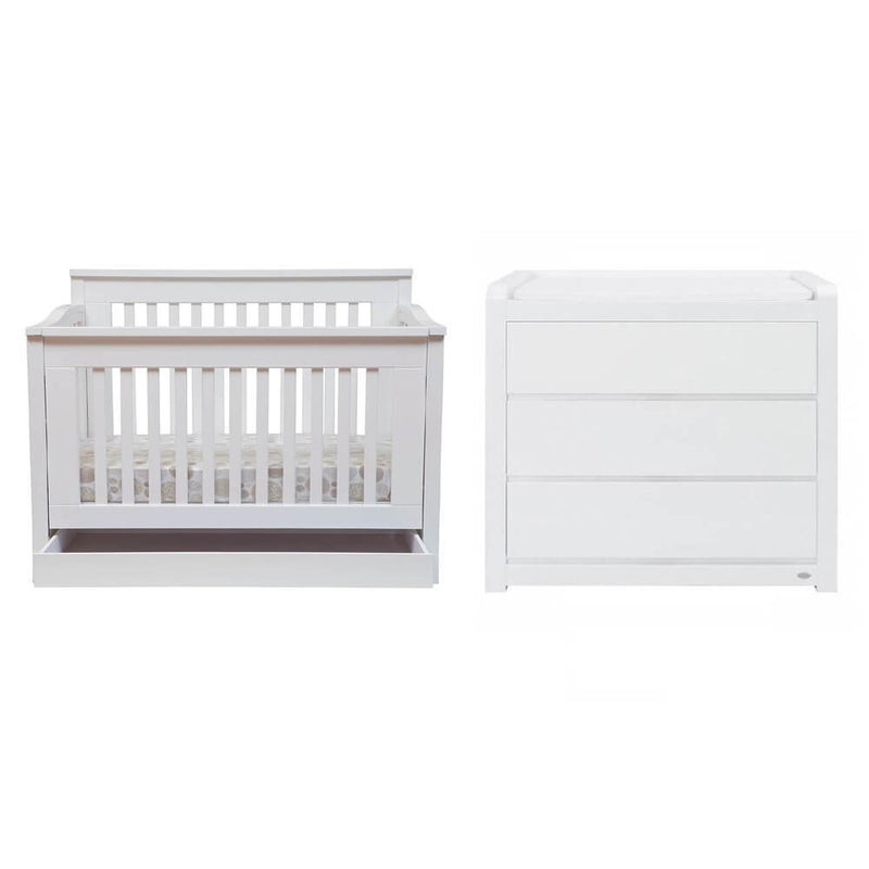 A Cocoon Flair Cot V2.0 with slatted sides and a matching white Cocoon change table are displayed side by side against a plain background.