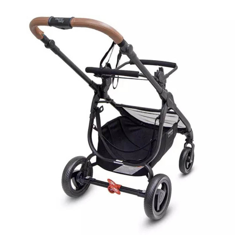 The Valco Baby Trend Ultra Car Capsule Adapter by Valco Baby attaches to a black pram frame with four wheels, a brown handlebar, storage basket below, a small red rear accessory, and an empty seat area for travel system compatibility.