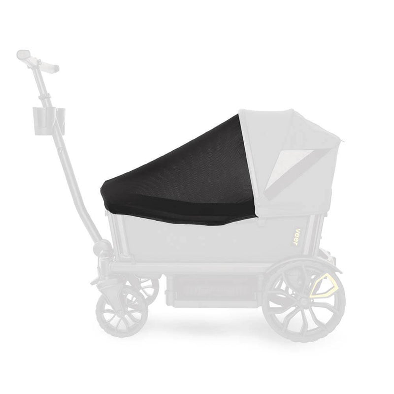 A Veer Bug Shield by Veer covers part of a Cruiser wagon stroller, shading and ventilating the seating area. The rest of the stroller and handle appear faded in the background.