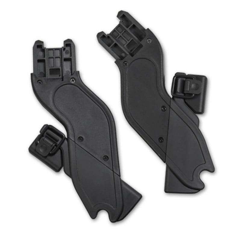 Two black UPPAbaby VISTA Lower Adaptors by UPPAbaby, made of molded plastic with locking mechanisms, are displayed side by side against a white background.