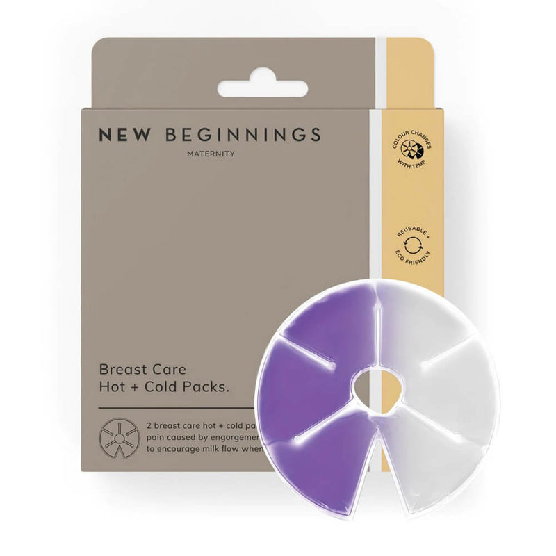 A circular, reusable New Beginnings Breast Care Hot & Cold Pack 2pc—half purple, half clear—is shown in front of beige packaging. Designed to fit around the breast, it provides hot or cold therapy for relief from mastitis and related discomfort.