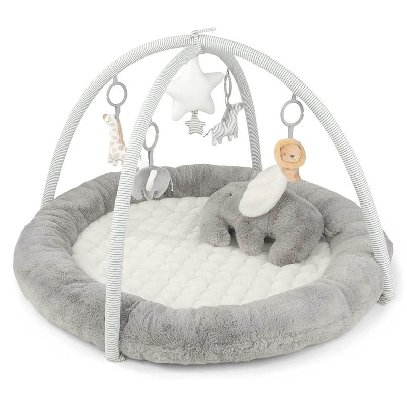 The Mamas & Papas Welcome to the World Playmat & Gym features a plush gray and white quilted base, an elephant pillow, overhead arches with hanging toys—star, giraffe, elephant, lion, and zebra—ideal for tummy time.