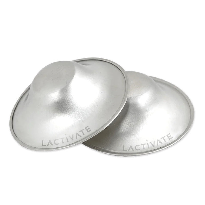 Two Lactivate Silver Nursing Cups from the Lactivate brand are shown overlapping on a white background, designed to support nipple healing and provide comfort during breastfeeding.