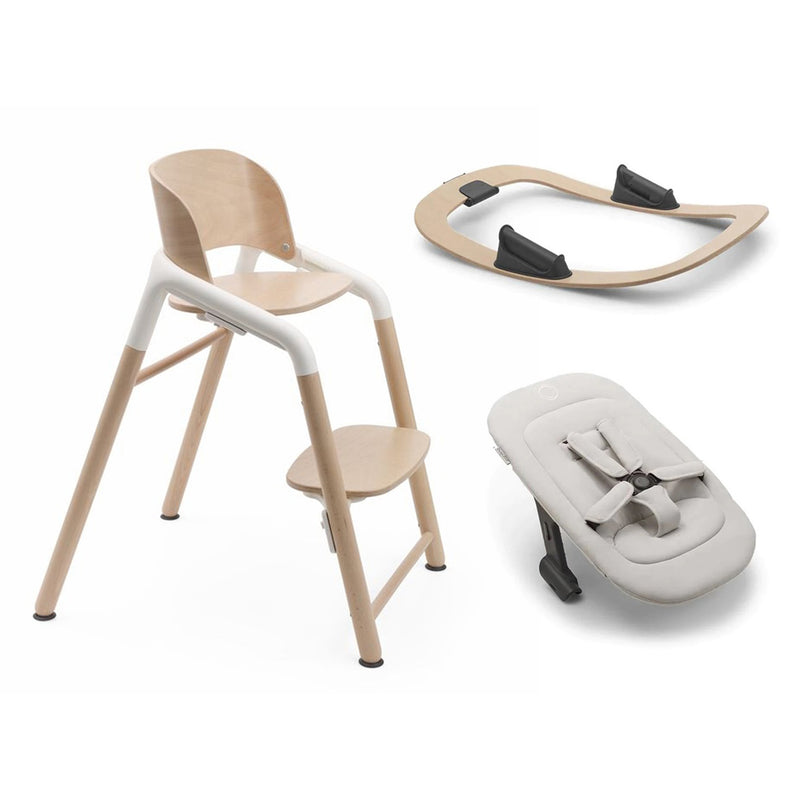 The Bugaboo Giraffe Newborn Bundle by Bugaboo features a modern adjustable high chair with white accents, a curved wooden attachment, and a beige baby seat with safety straps—all shown on a white background.