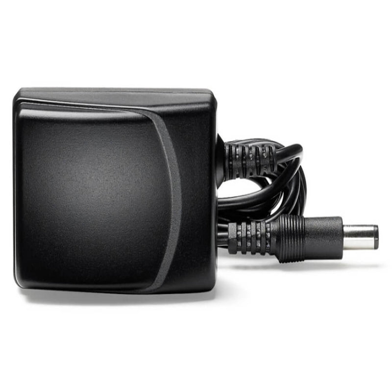 A black rectangular Medela Mains Adapter AU for Swing with a coiled cable and cylindrical connector, designed for the Swing breast pump, displayed on a white background.
