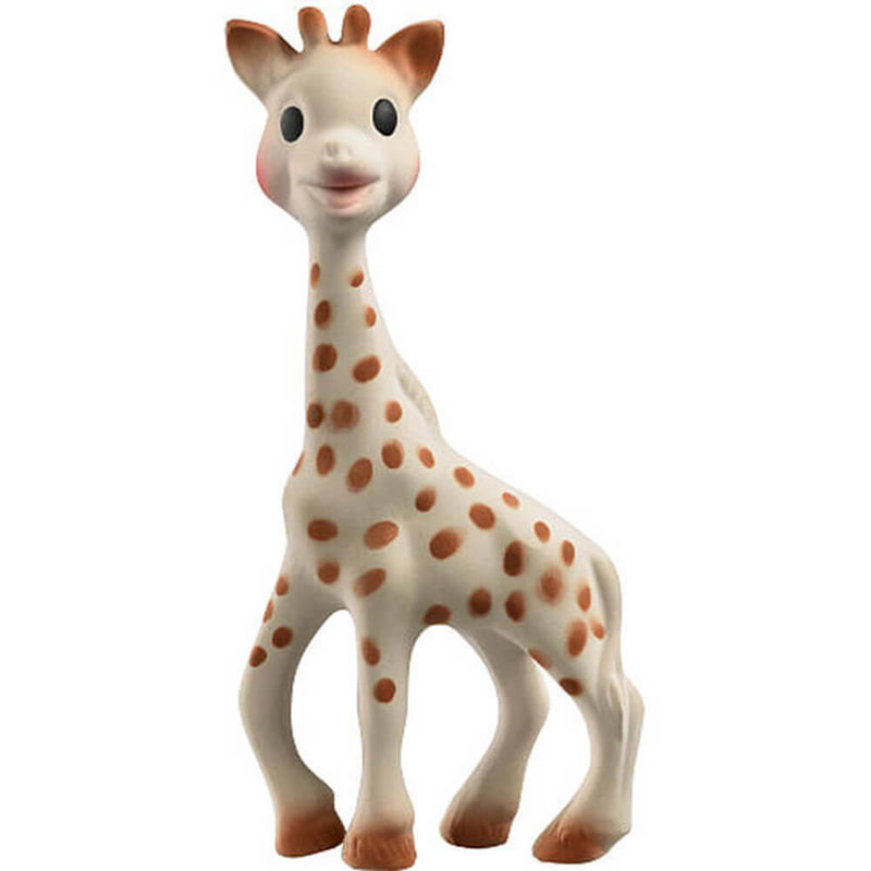 The Sophie La Girafe by Sophie is a natural rubber baby teething toy with brown spots, rosy cheeks, a smiling face, large eyes, small horns, and four sturdy legs standing upright.